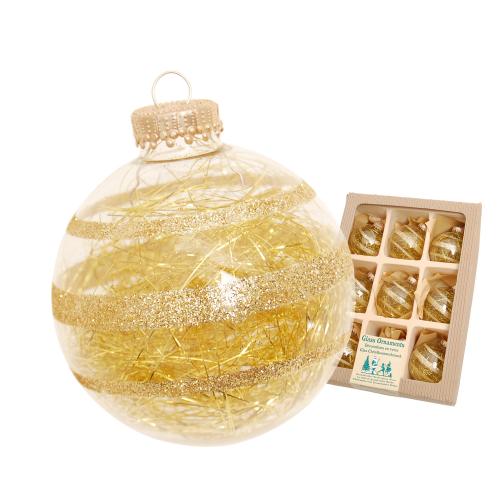 Kugel mit goldenen Glitterstreifen, innen gefllt mit goldenem Tinsel 7cm 